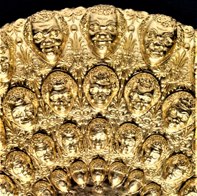 Golden-Phial-With-African-Faces-10.png